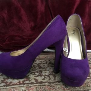 Purple suede pumps